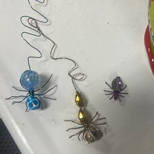 Wire hanging spiders. Some hang some just sit there. We hang them in the car.
